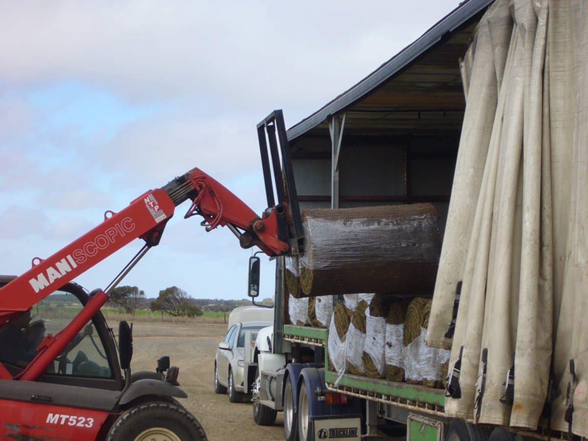 Pallet of fresh roll-out turf ready for delivery